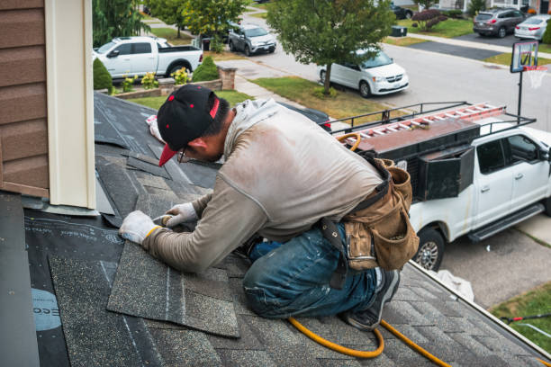 Professional Roofing technician working in Rhome, TX
